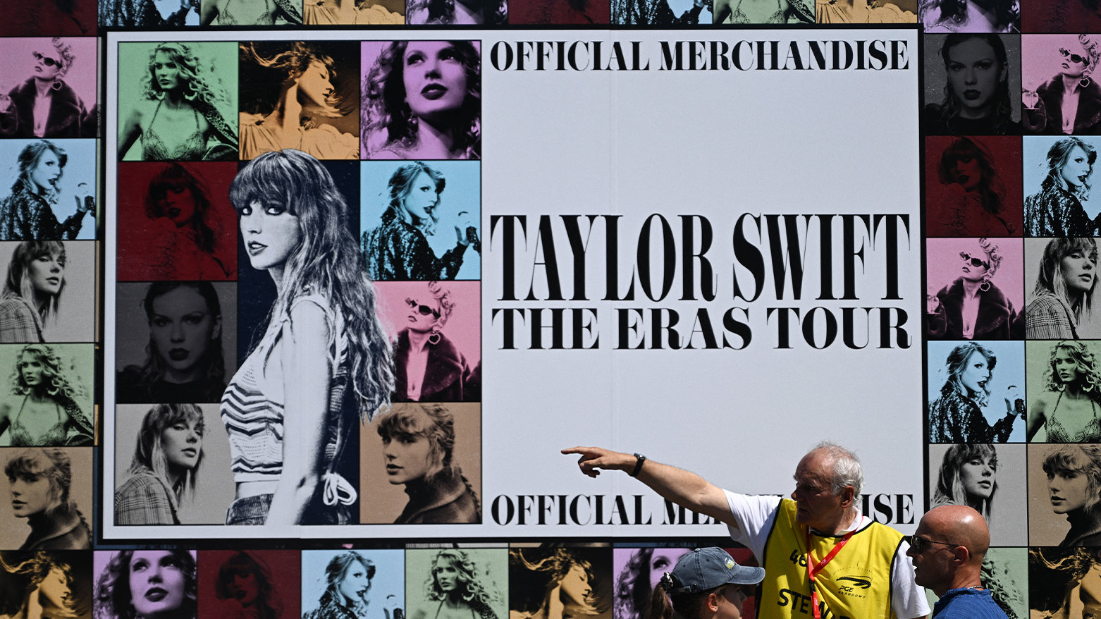 A steward guides fans of US singer Taylor Swift, also known as Swifties, as they arrive to buy merchandise outside the National Stadium in Warsaw on July 31, 2024. (Photo: Sergei GAPON / AFP)