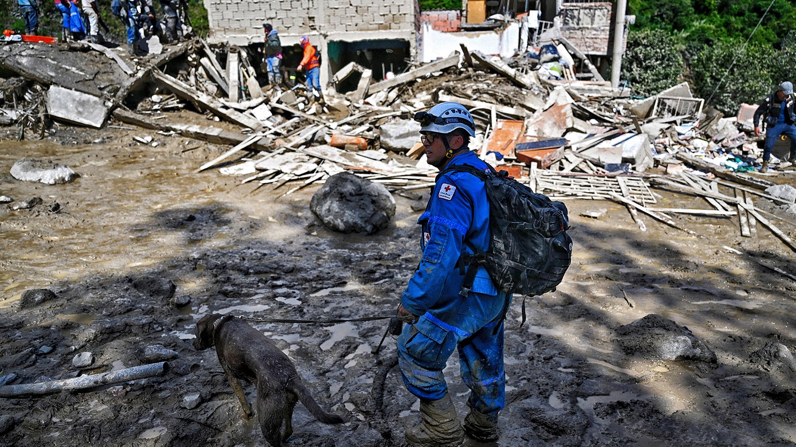 A member of the rescuing team works at the site of a landslide in the Quetame municipality, Cundinamarca department, Colombia, on July 18, 2023. (Photo: AFP)