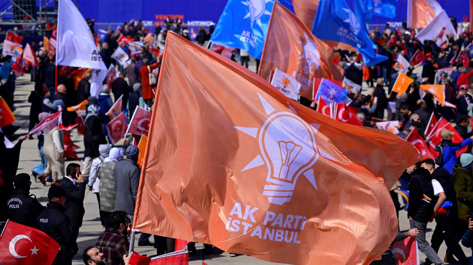 Supporters of Justice and Development (AK) Party hold party's flags. (Photo: AFP)