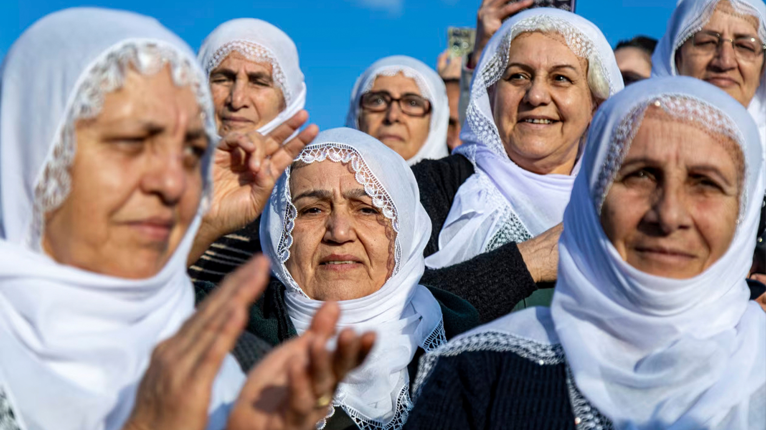 Kurdish women in Diyarbakir gathered to watch a broadcast of the reading of a statement written by PKK leader Abdullah ÖOalan. (Photo: AP)