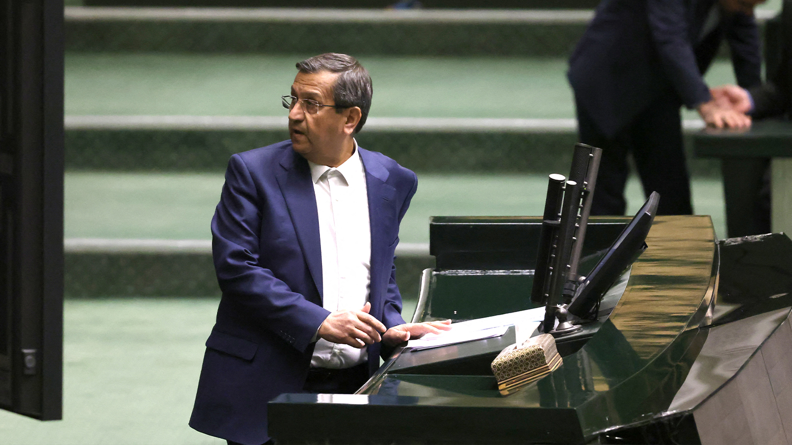 Iran's Finance Minister Abdolnaser Hemmati delivers a speech to members of parliament in Tehran on March 2, 2025. (Photo: AFP)