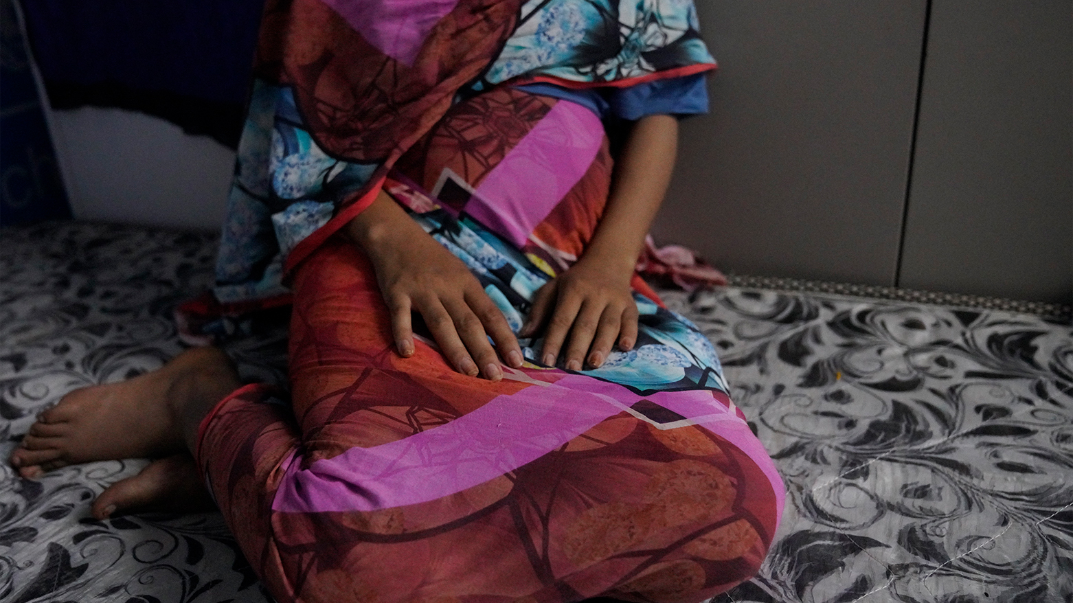 A 16-year rape victim rests on a mattress at a UNICEF office in Sudan, Dec. 2, 2024. (Photo: AP)