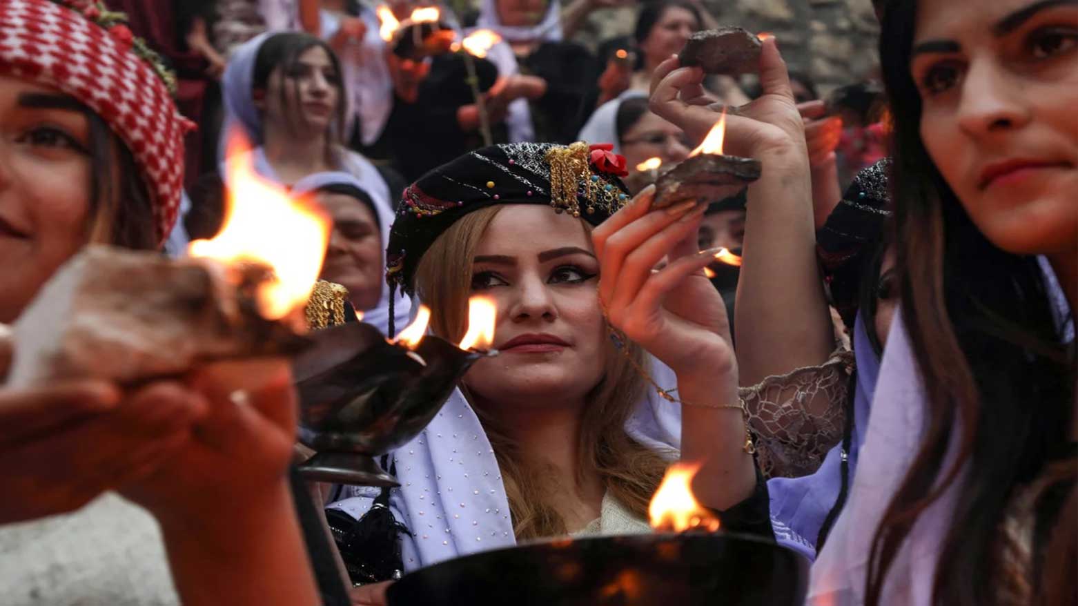 Yazidi women gather at the ancient Temple of Lalish, during a ceremony marking the Yazidi New Year. (Photo: AFP)