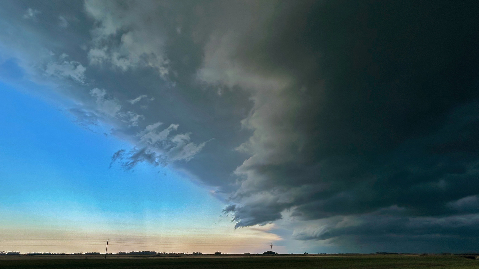 Storm clouds are pictured on the road between Coronel Vidal and Mar del Plata, Buenos Aires province, Argentina on March 7, 2025. (Photo: AFP)