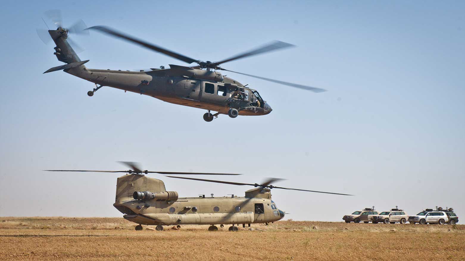 A UH-60 Blackhawk takes off from a nearby outpost following a key leader engagement near Manbij, Syria, June 21, 2018. (Photo: CENTCOM)