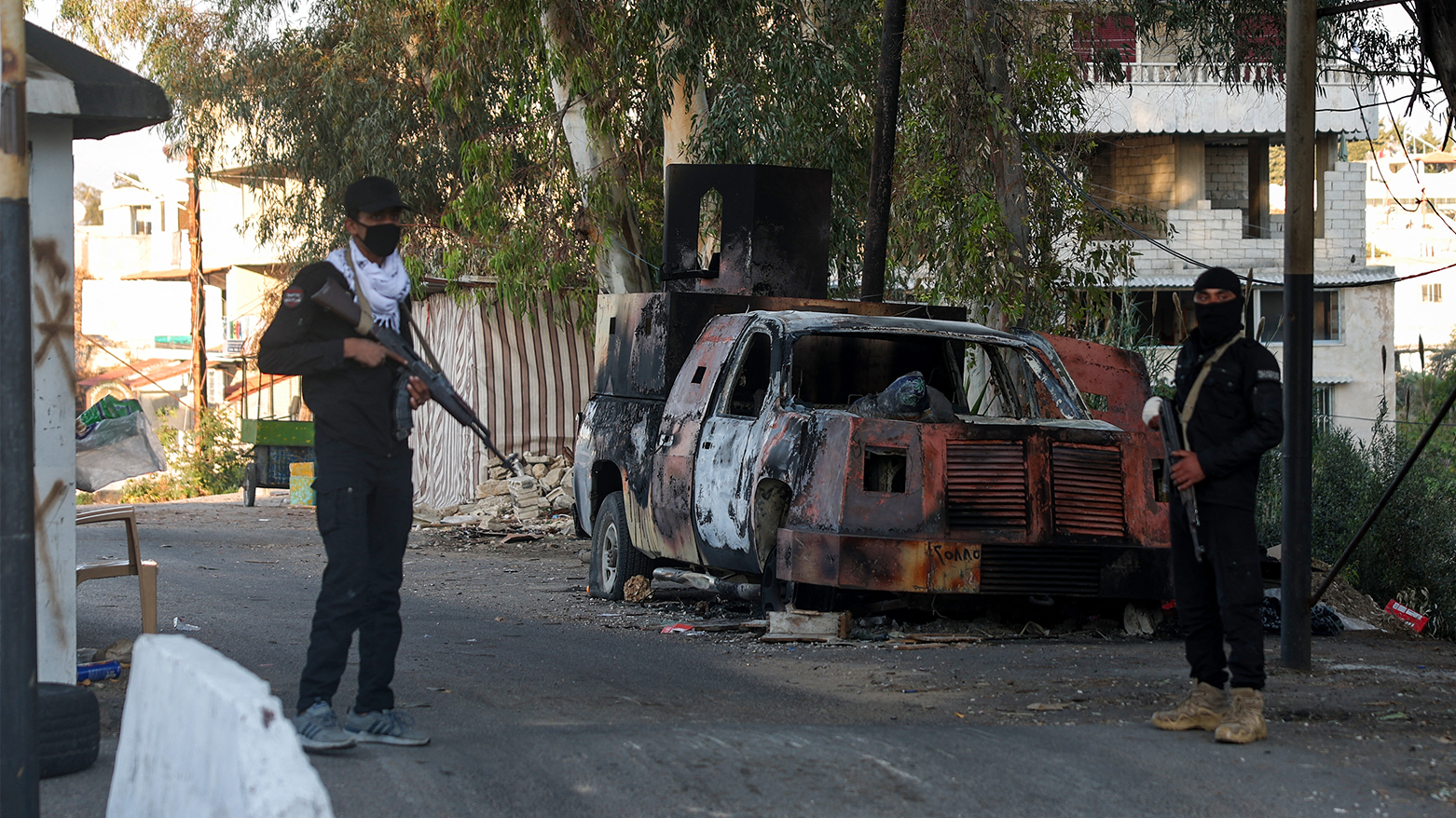 Security forces loyal to the interim Syrian government stand guard at a checkpoint previously held by supporters of deposed president Bashar al-Assad, in the town of Hmeimim, in the coastal province of Latakia, on Mar. 11, 2025. (Photo: AFP)