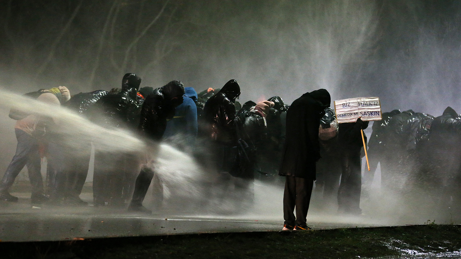 Turkish anti-riot police use water canon as they clash with Middle East Technical University (ODTU) students protesting against the arrest of Istanbul's mayor, in Ankara on Mar. 20, 2025.(Photo: AFP)