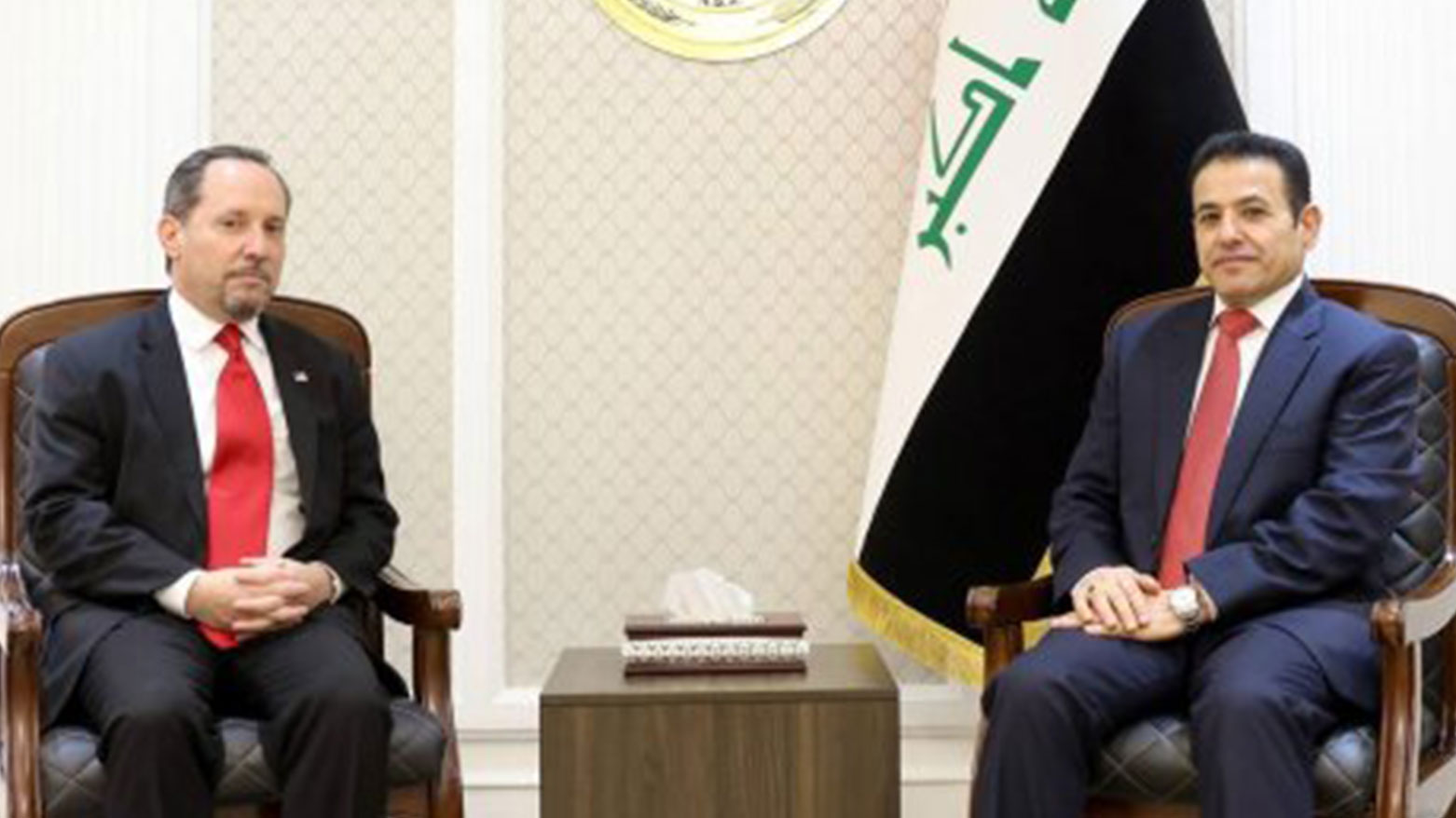 Iraq’s National Security Adviser Qasim al-Araji (right) during his meeting with and US Charge d’Affaires in Baghdad Daniel Rubinstein, March 23, 2025. (Photo: INA)
