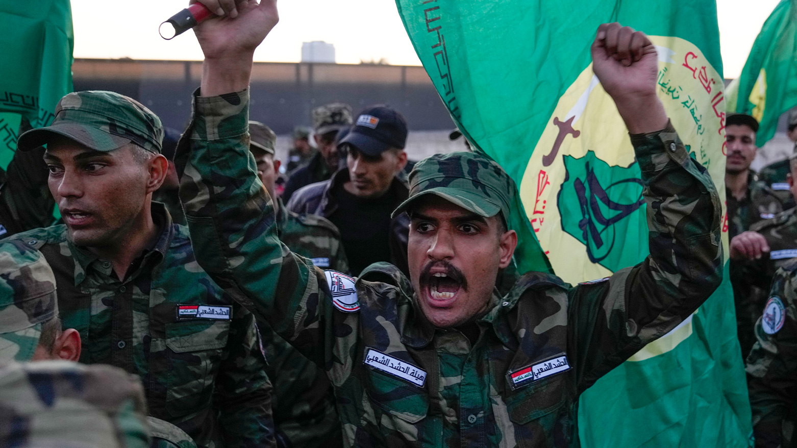 Members of an Iraqi Shia militant group are shown in this photo. (Photo: AP)
