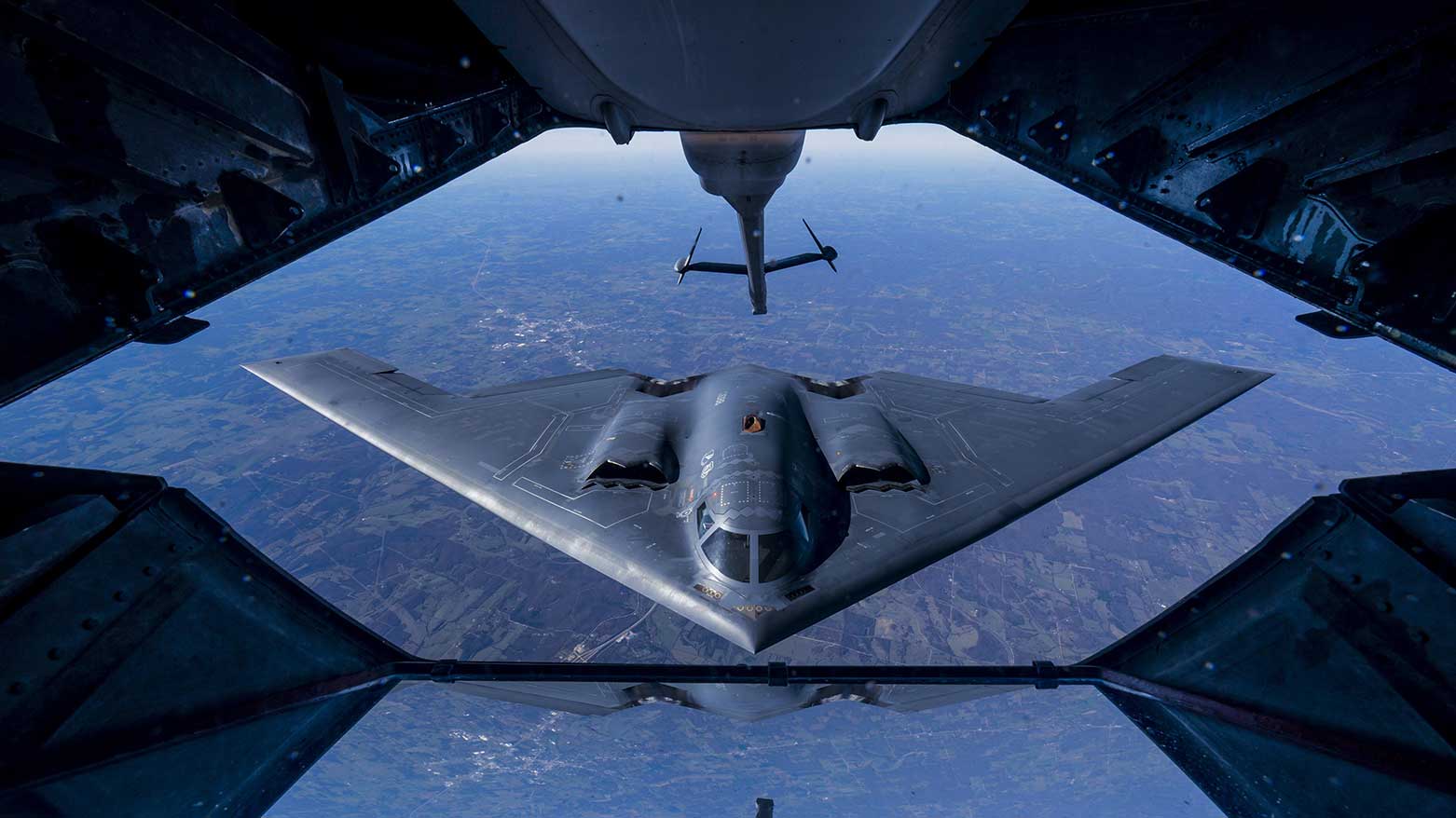 A 2nd Air Refueling Squadron KC-10 Extender from Joint Base McGuire-Dix-Lakehurst, N.J., prepares to refuel a B-2 Spirit, during a training exercise near Kansas, Nov. 10, 2016. (Photo: USCENTCOM)