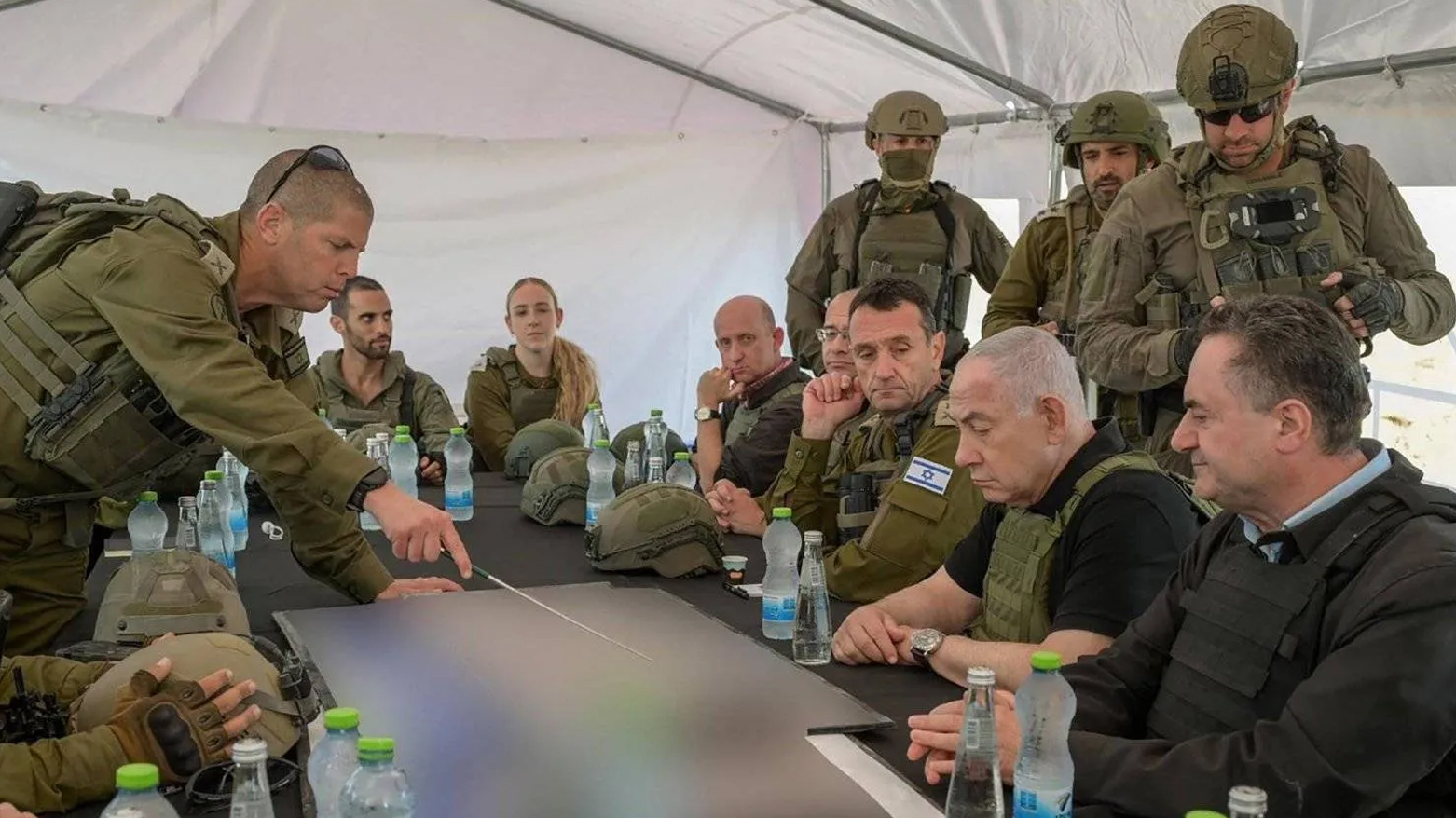 Israel's PM Benjamin Netanyahu (R), DM Israel Katz (R) and army Chief-of-Staff Herzi Halevi (C) during a briefing in the Netzarim Corridor, on Nov. 19, 2024. (Photo: AFP)