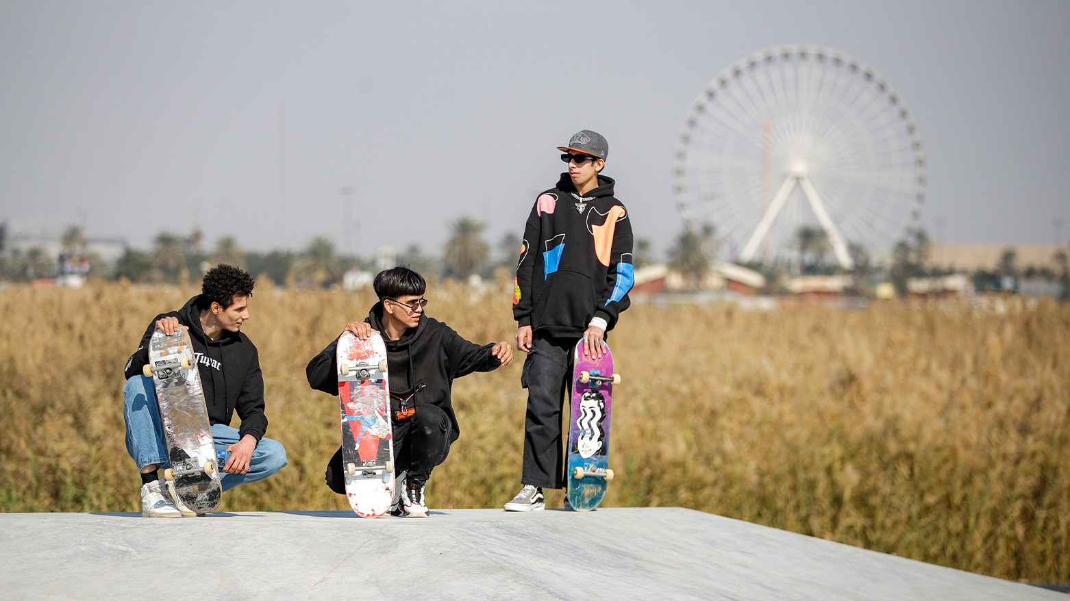 Youth Iraqis hold their skateboards as they practice in the first skatepark of Baghdad, Iraq, Saturday, Feb. 1, 2025. (Photo: AP/Anmar Khalil)