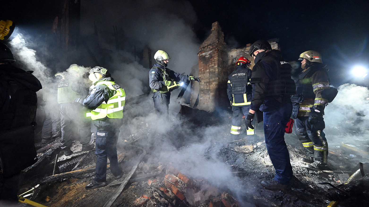 Ukrainian emergency services work at the site of a residential building following a drone attack in Kharkiv, on Apr. 4, 2025. (Photo: AFP)