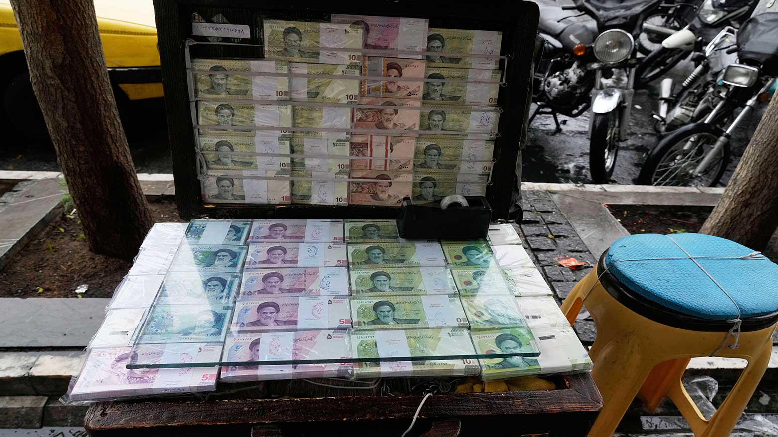 Iranian banknotes are displayed by a street money exchange at Ferdowsi street, in downtown Tehran, Iran, April 5, 2025. (Photo: AP)