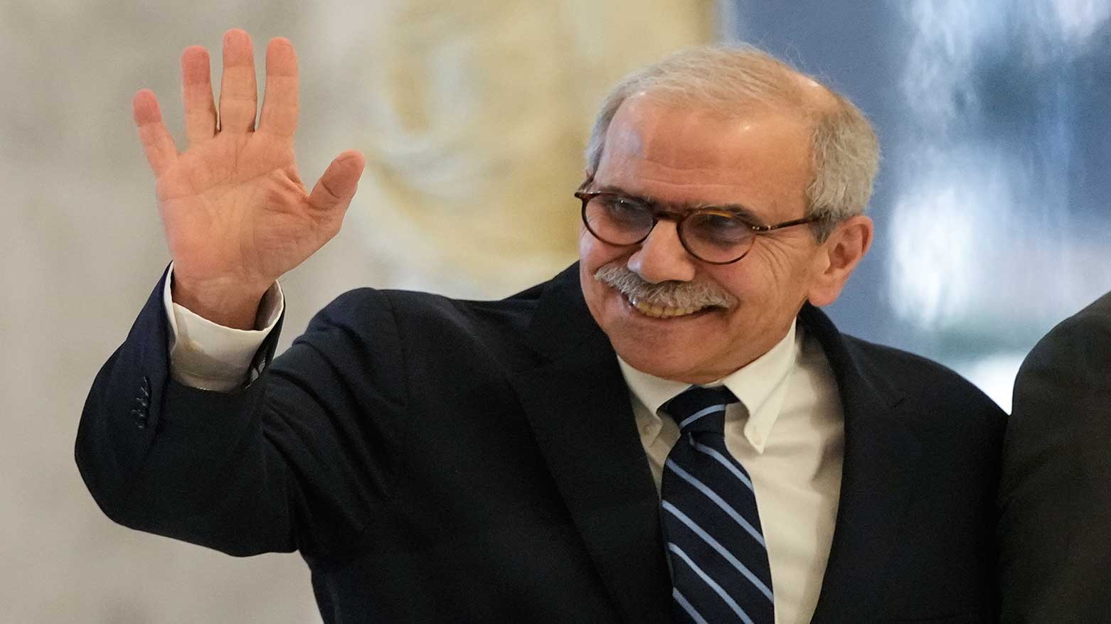 Lebanese PM-designate Nawaf Salam waves to journalists as he arrives at the presidential palace to meet with Lebanese President Joseph Aoun in Beirut, Lebanon, Jan. 14, 2025. (Photo: AP)