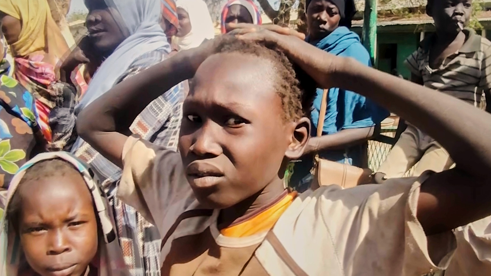 In this video frame, Sudanese displaced children take shelter in a school after being evacuated by the Sudanese army. (Photo: AP)