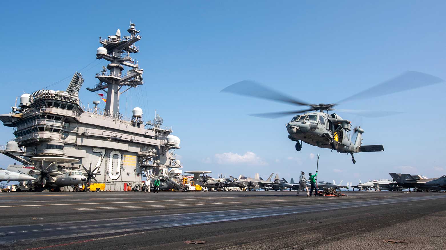 MH-60S Sea Hawk helicopter hovering over the USS Carl Vinson aircraft carrier while operating in the Middle East on April 12, 2025. (Photo: AP)