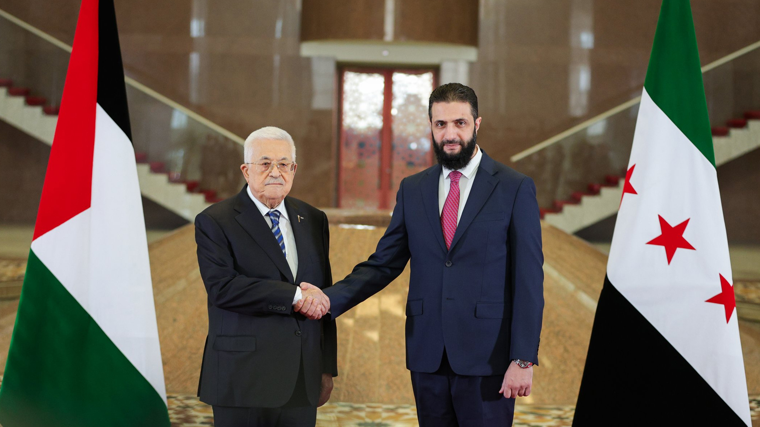 أحمد الشرع ومحمود عباس