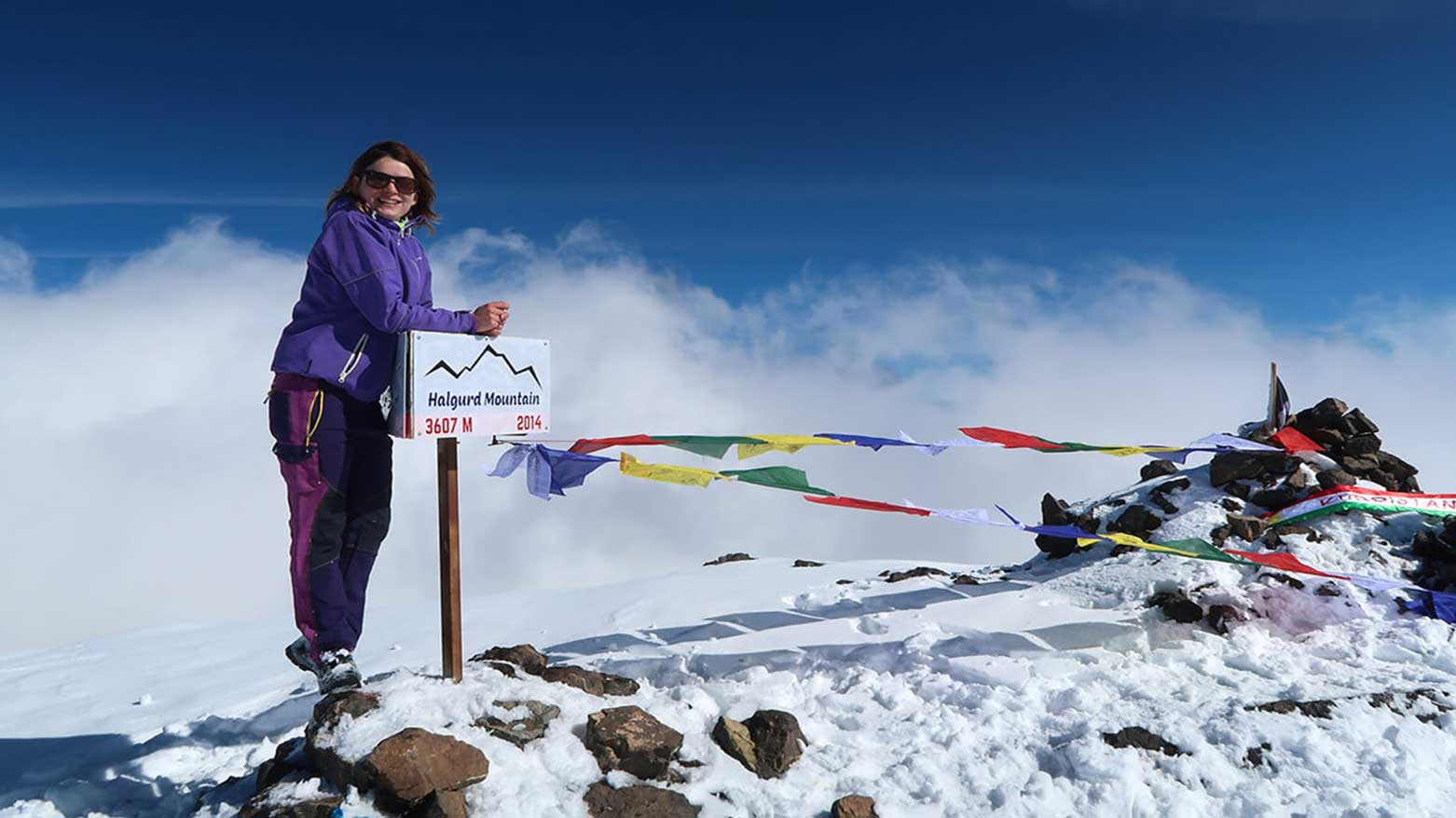 The full-time world traveler and Globetrotting Detective travel blogger Diana Lesko, on Halgurd Mountain, the Highest Mountain in Kurdistan Region of Iraq. (Photo: Lesko)