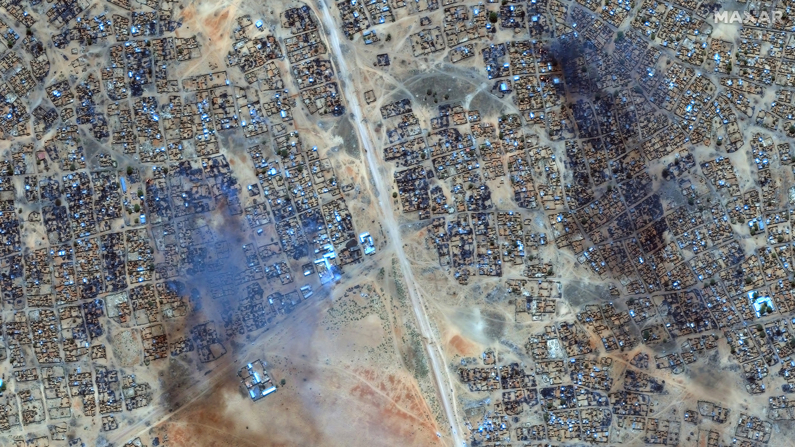 Image taken by Maxar Technologies shows smoke at Zamzam camp near the besieged Darfur city of El-Fasher. (Photo: AFP)