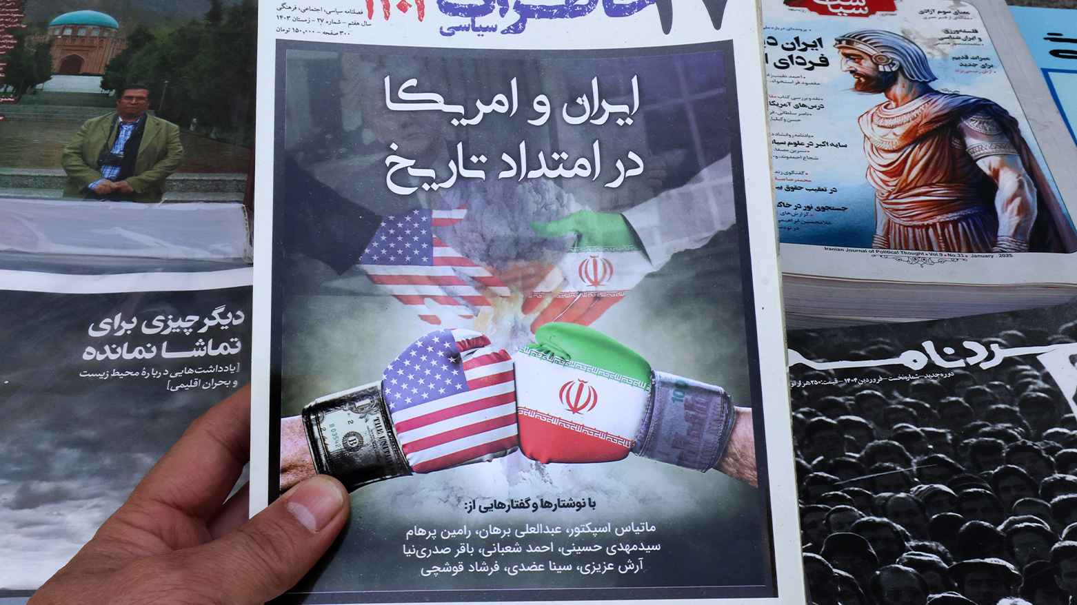 This picture shows a magazine front page at a kiosk in Tehran on April 19, 2025, featuring the Iran-US talks. (Photo: AFP)
