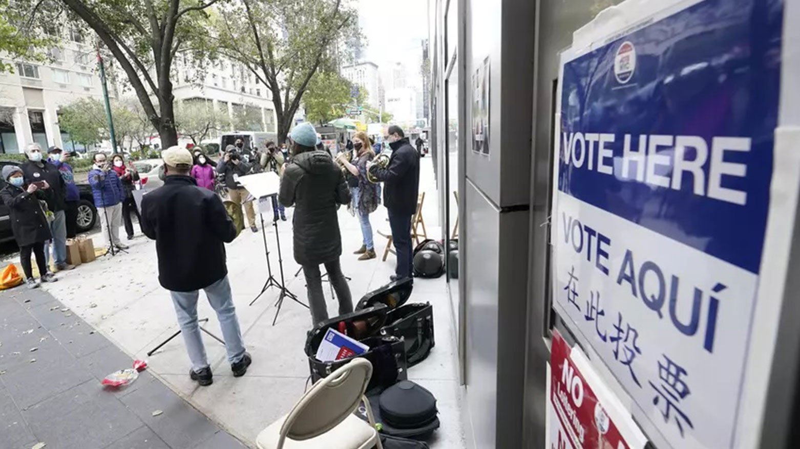Members of the Metropolitan Opera Orchestra play for voters outside a polling place on Election Day, Nov. 3, 2020, in New York. (Photo: AP)