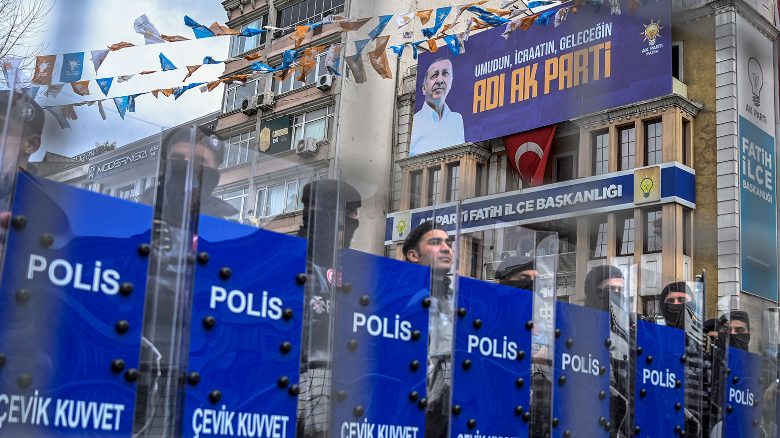 Police officers stand in a street around the provincial police headquarters where Istanbul Mayor Ekrem Imamoglu is being held after his arrest, in Istanbul on March 19, 2025. (Photo: AFP)