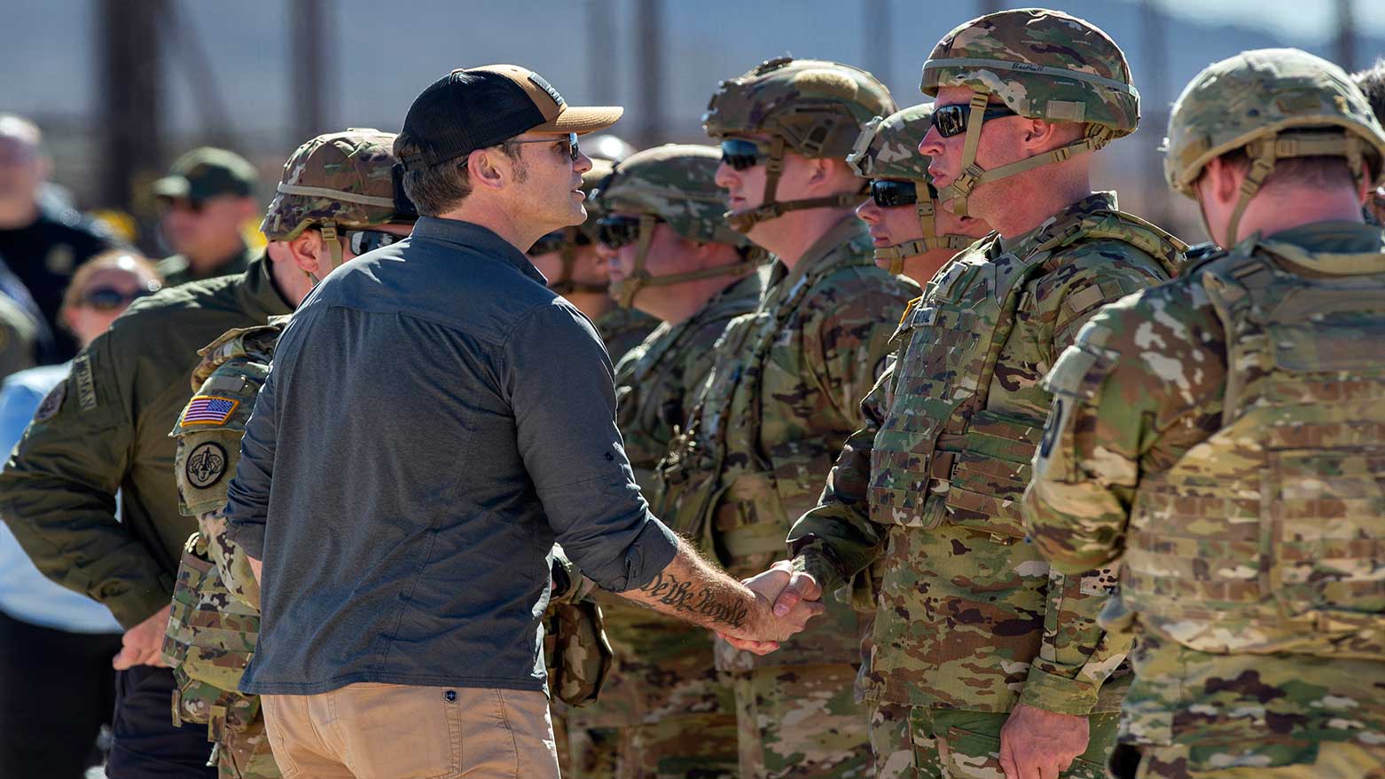 US Defense Secretary Pete Hegseth, left, shakes hands with an Army soldier while visiting the US-Mexico border, Feb. 3, 2025. (Photo: AP)