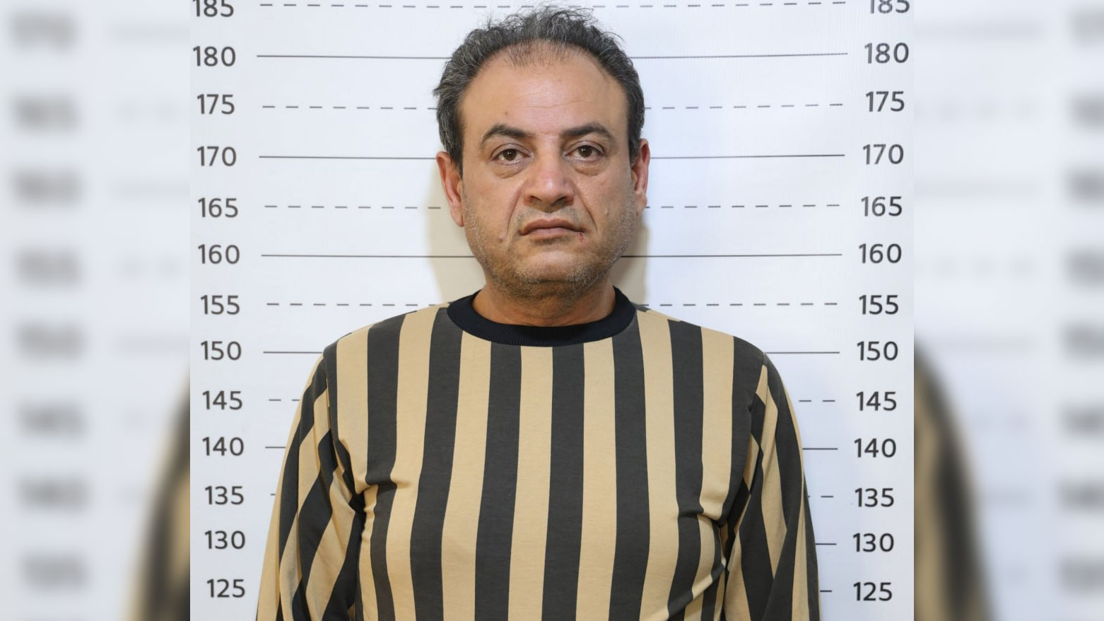 وێنەی بەسام دوای دەستگیرکردنی