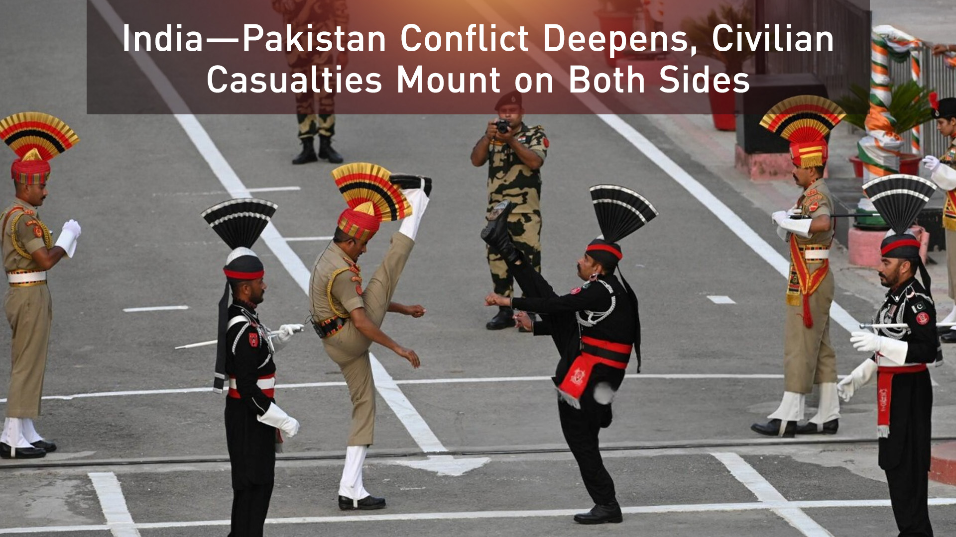 Pakistani Rangers (in black) and Indian Border Security Force (BSF) soldiers take part in 'Beating the Retreat' ceremony. (Photo: AFP)