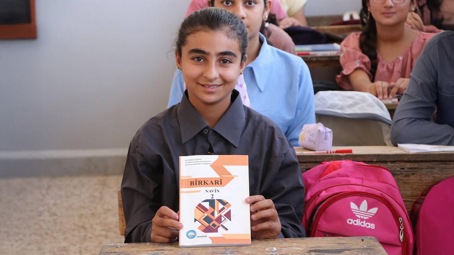 Kurdish female students learn with Kurdish textbooks at a school in the city of Qamishlo, western Kurdistan (Photo: Asharq Al-Awsat)