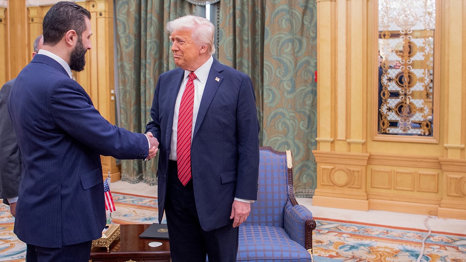 U.S. President Donald Trump (R), shaking hands with Syrian President Ahmad al-Sharaa (L), in  Riyadh, May 14, 2025.(Photo: SANA)
