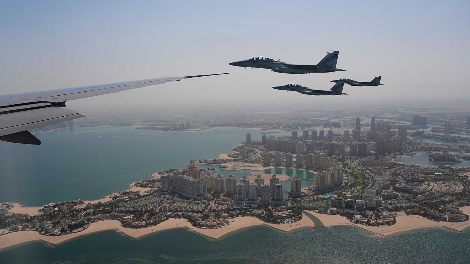 Qatar Emiri Air Force F-15s provide an honorary escort for Air Force One, carrying President Donald Trump, as it arrives in Doha, Qatar, May 14, 2025. (Photo: AP)
