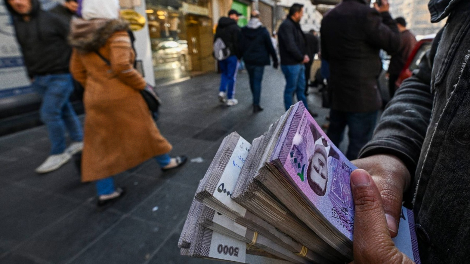 Street money changer with Syrian currency in Damascus, Dec. 16, 2024. (Photo: AFP)