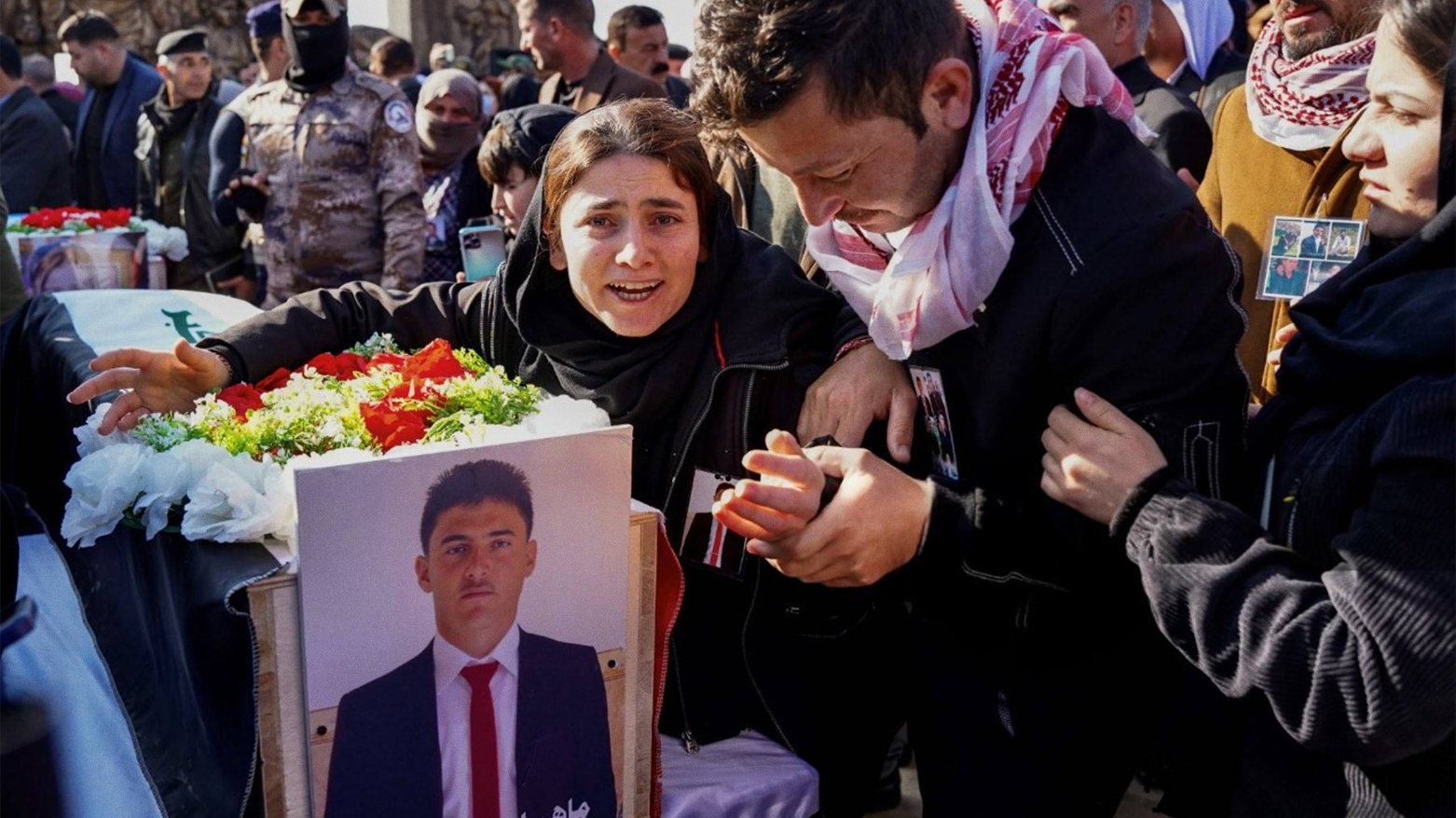 Mourners gather in Sinjar for 41 Yazidi victims of ISIS, Jan. 24, 2024. (Photo: AFP)