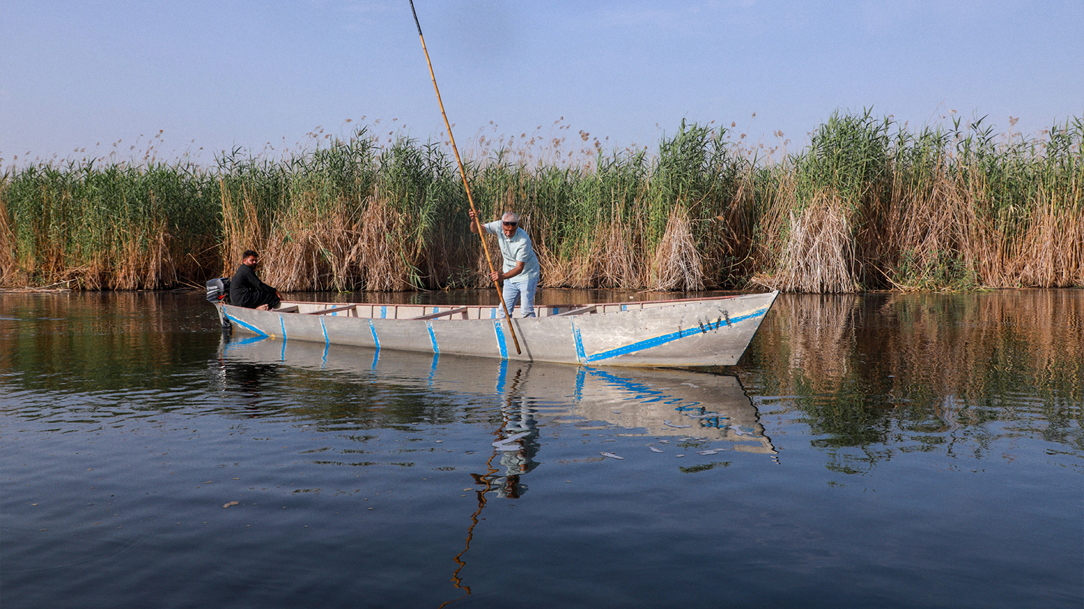 An Iraqi environmentalist measures water in Iraq’s drying Hawizeh Marshes, near Iran’s border, on April 25, 2025. (Photo: AFP)
