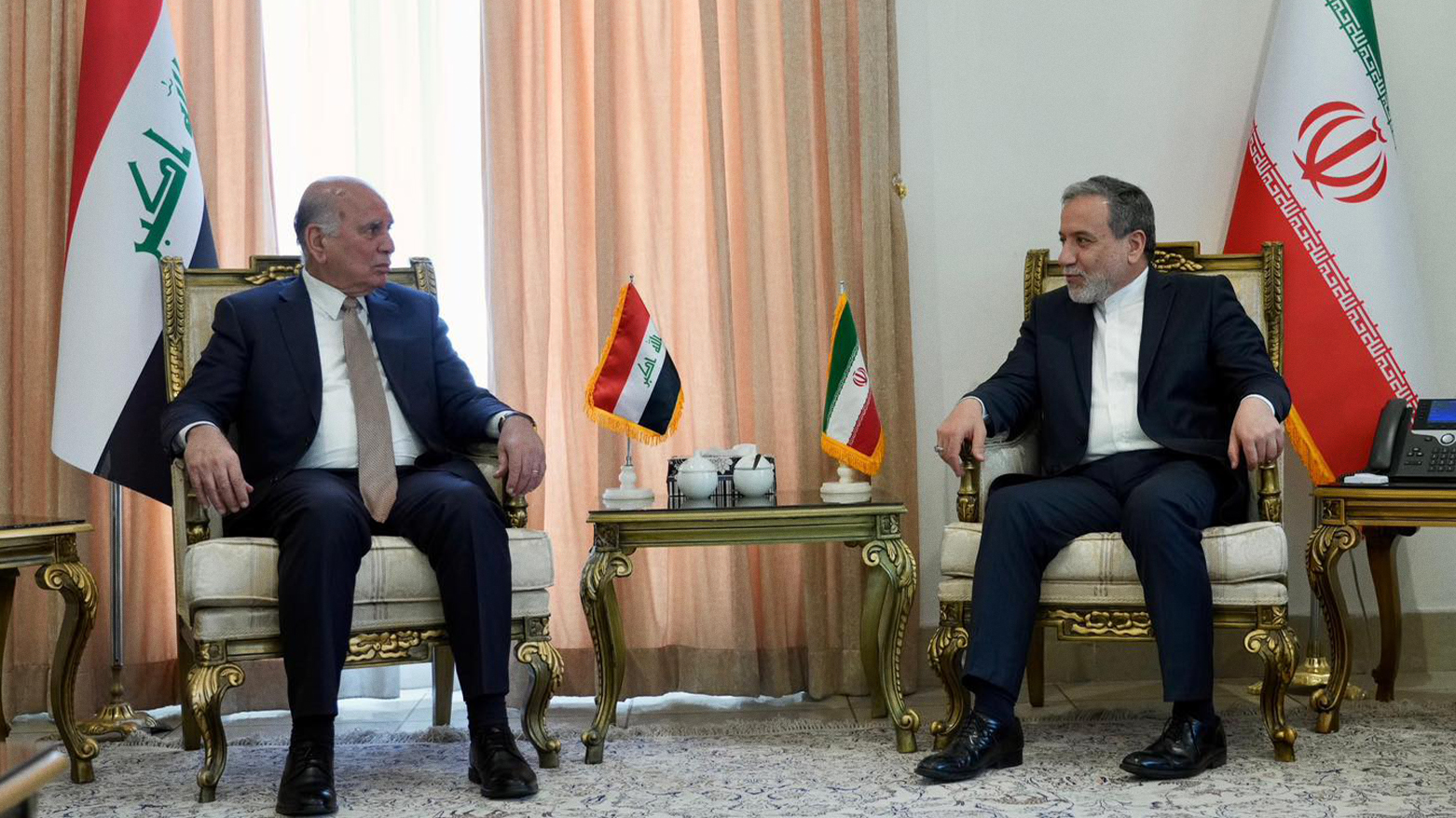 L-R: Iraq's FM Fuad Hussein and Iran's FM Abbas Araghchi. (Photo: Iraq's Foreign Ministry)