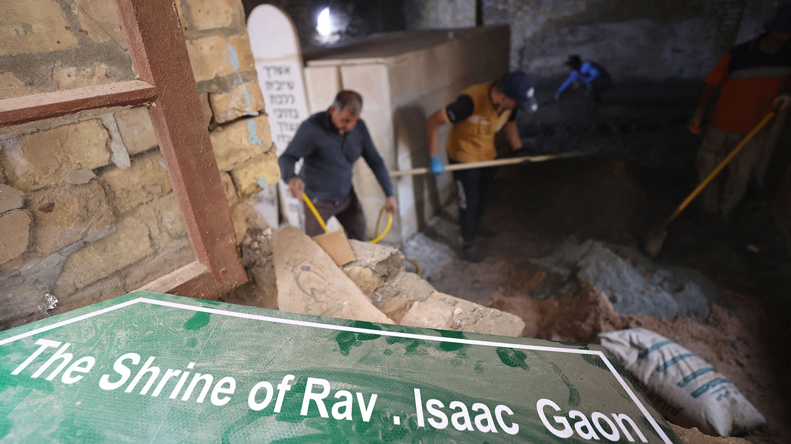 Iraqi workers restore the centuries-old shrine of Jewish Rabbi Isaac Gaon in central Baghdad's al-Kifah neighborhood on April 21, 2025. (Photo: AFP)