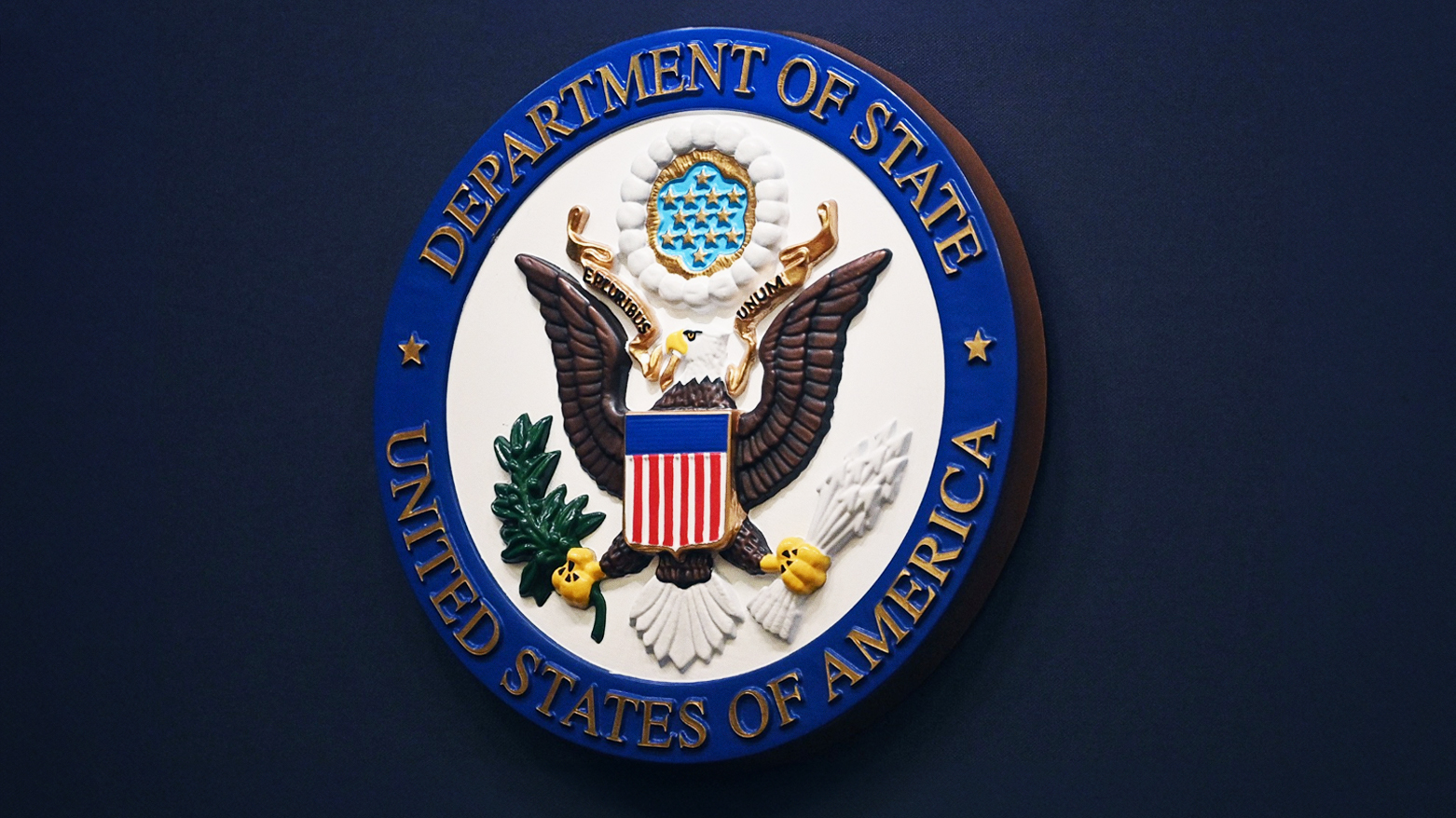 The U.S. State Department seal on a briefing room lectern in Washington, Jan. 31, 2022. (Photo: AP)