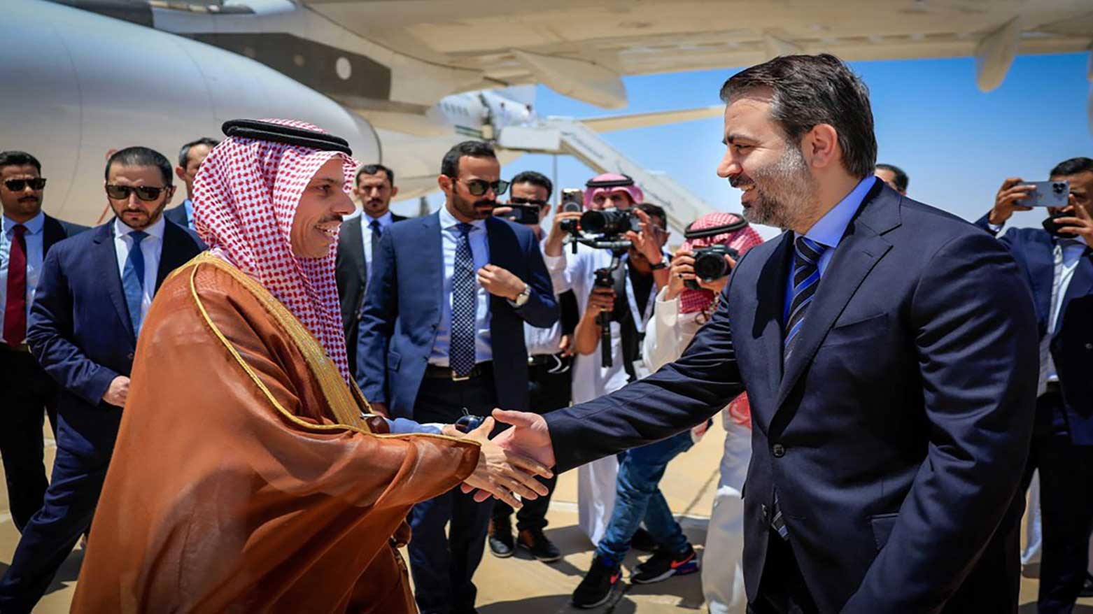 Syria's interim FM Asaad Shaibani (R) receiving Saudi Arabia's FM Prince Faisal bin Farhan (L) at Damascus International Airport on May 31, 2025. (Photo: SANA)