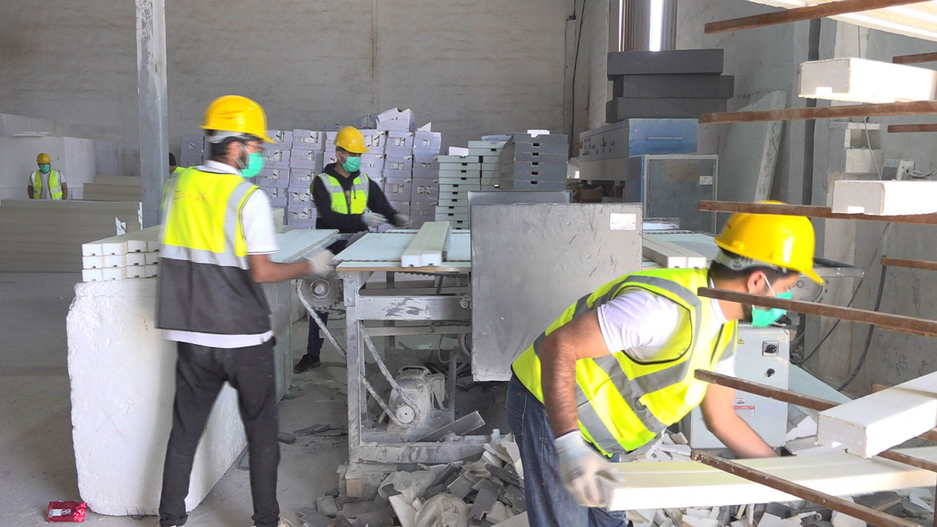 Factory workers, at a foam and sponge factory, in the Kurdistan Region of Iraq. (Graphics: Kurdistan24)