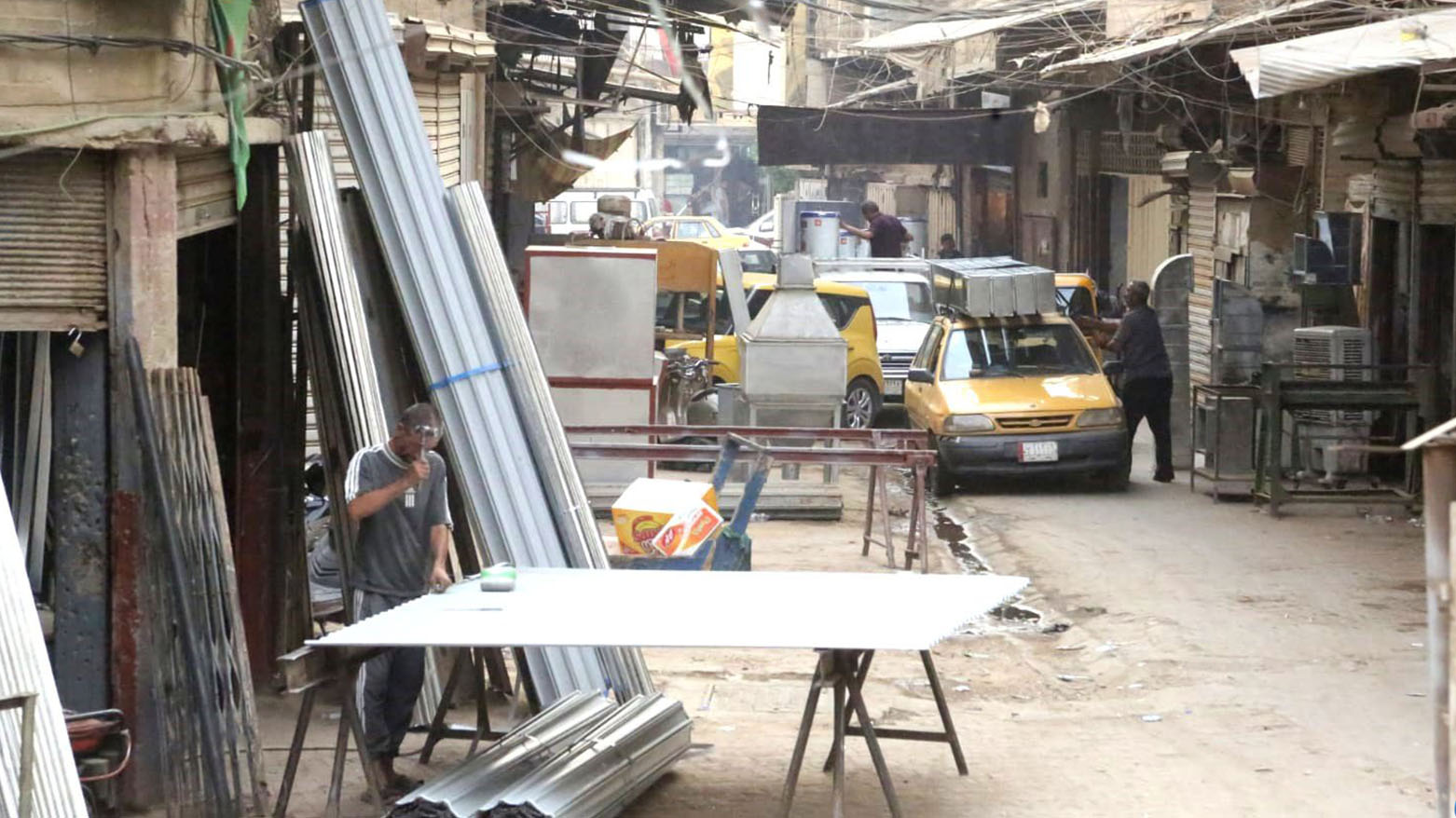 A residential neighborhood turned industrial workshop in Baghdad. (Photo: Kurdistan24)
