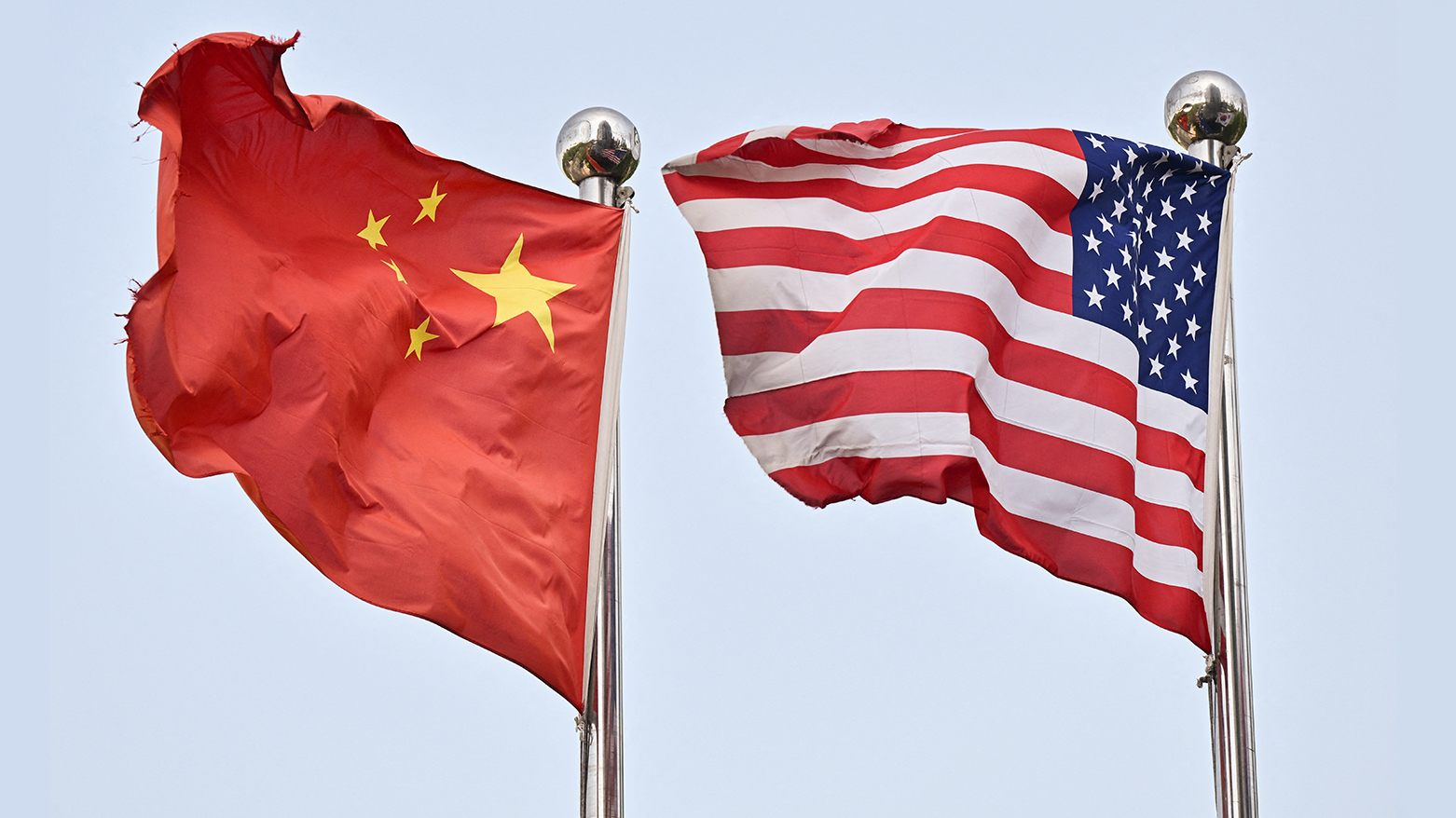 Chinese and US flags wave outside a technology company in Beijing on Apr. 17, 2025. (Photo: AFP)
