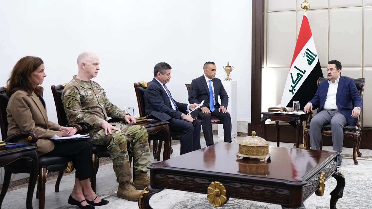 Iraqi PM Mohammed Shia’ al-Sudani (R),  U.S. Chargé d'Affaires in Iraq Steven Fagin (CL) next to him on the left Major General Kevin Leahy. (Photo: INA)