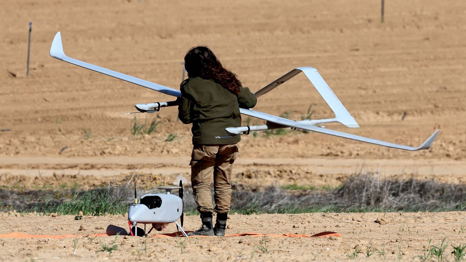An Israeli soldier prepares a drone before launching it towards the Gaza Strip from a position near the border in southern Israel on Jan. 10, 2024. (Photo: AFP)