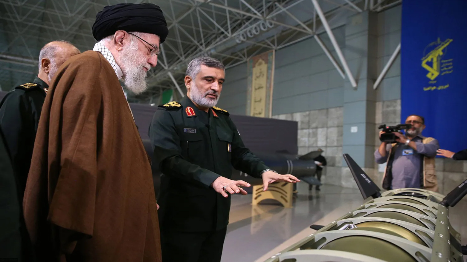 Commander of the Revolutionary Guards' missile unit, Amir Ali Hajizadeh, explains to Khamenei the components of the Fateh 1 hypersonic missile last year (Photo: Al-Morshed's website)