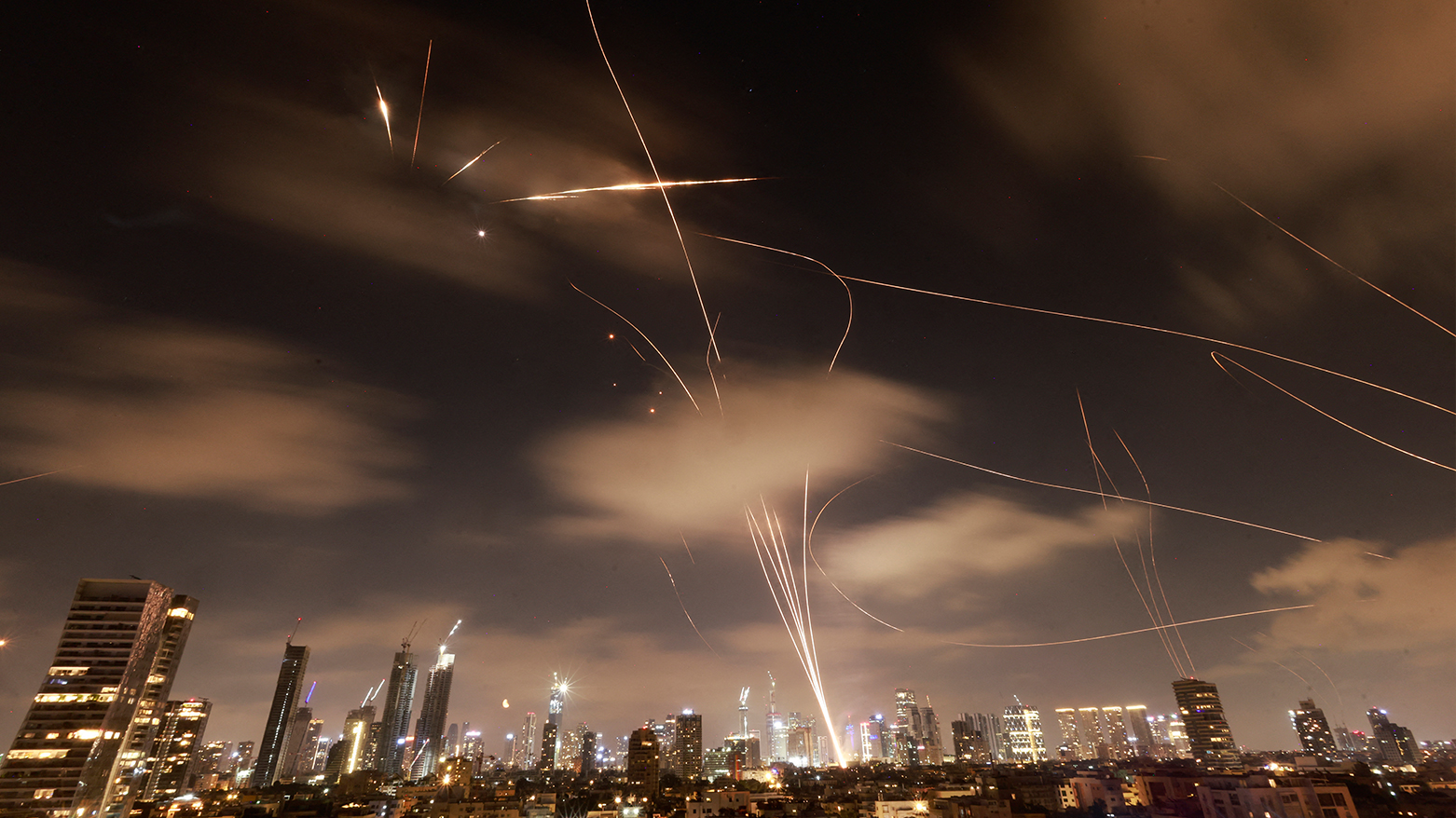 Israeli air defence systems are activated to intercept Iranian missiles over the Israeli city of Tel Aviv early on June 18, 2025. (Photo: AFP)
