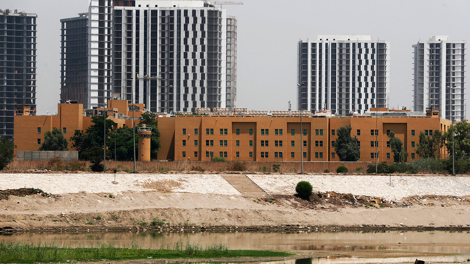 A picture taken on June 12, 2025 from across the Tigris River shows the US embassy compound in Baghdad's Green Zone. (Photo: AFP)