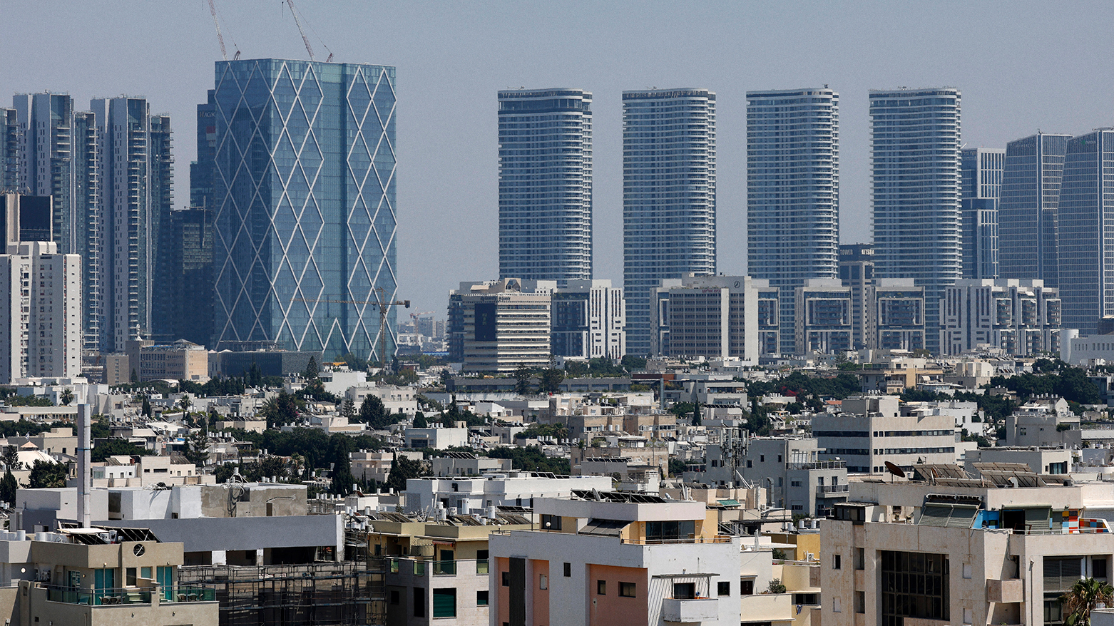 High-rise buildings are pictured in Tel Aviv on June 14, 2025. (Photo: AFP)