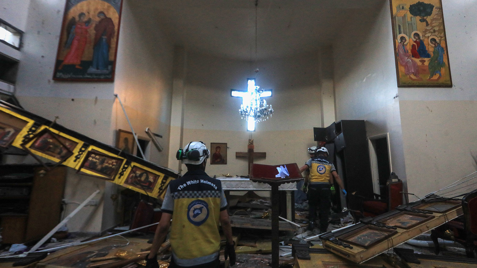 Rescuers inspect the damage at the site of a reported suicide attack at the Saint Elias church in Damascus' Dwelaa area on June 22, 2025. (Photo: AFP)
